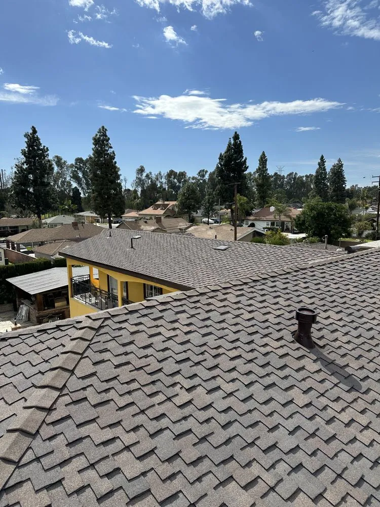 Slide of Alex's Top Roofing