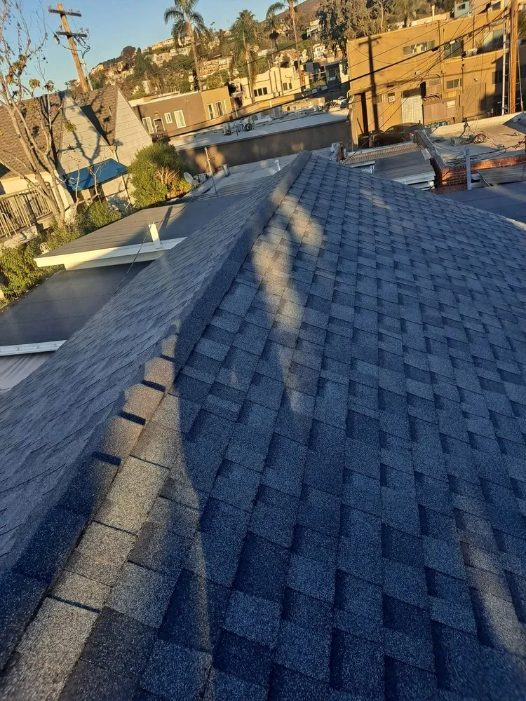 Slide of Alfaros and Son Roofing