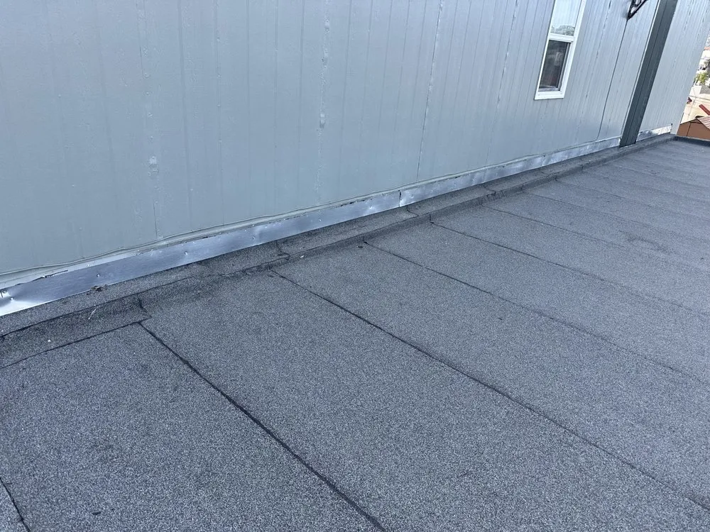 Slide of Algami Roofing