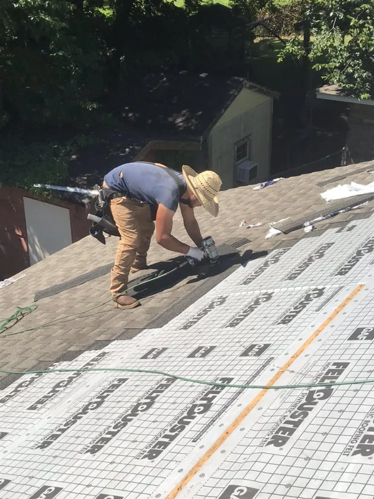 Slide of All about it roofing