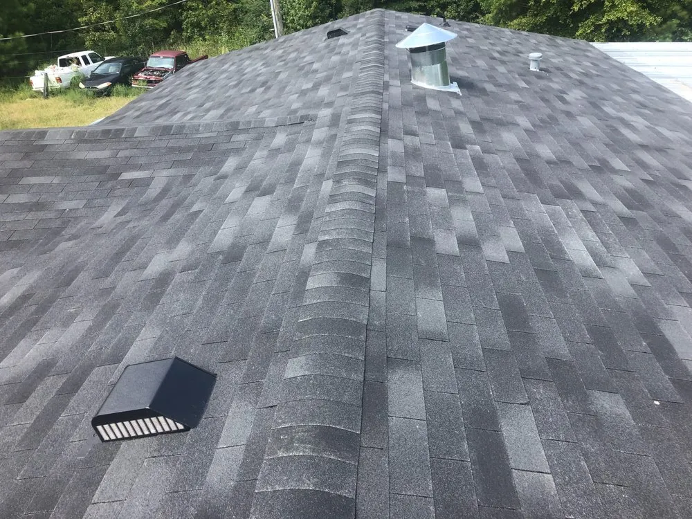 Slide of All About Roofing & Construction