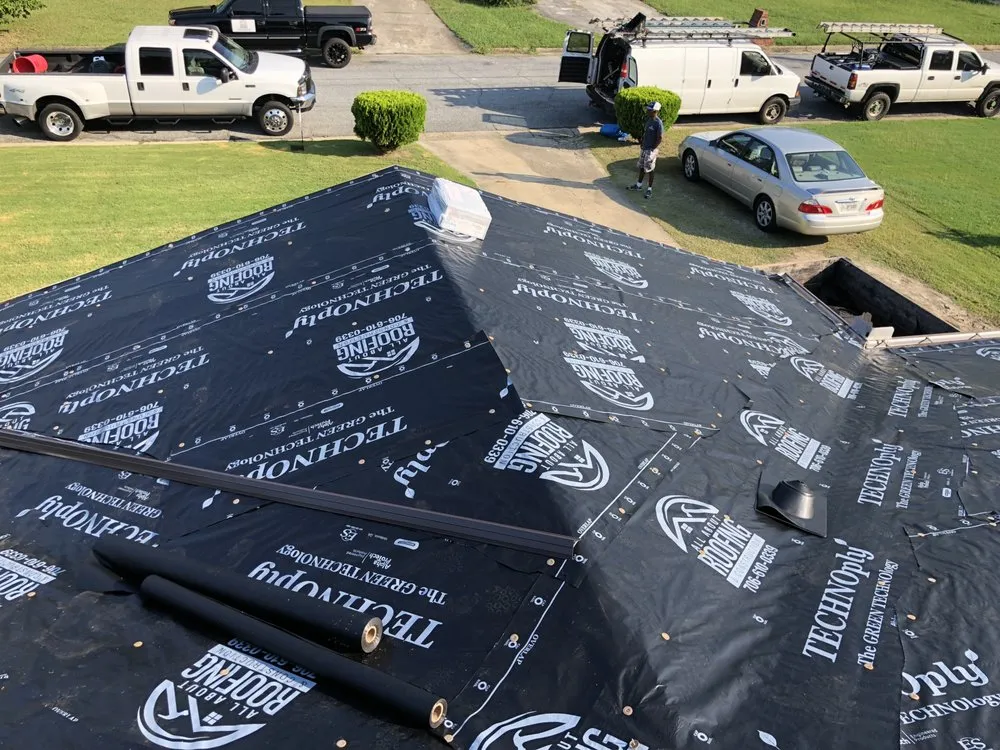 Slide of All About Roofing & Construction