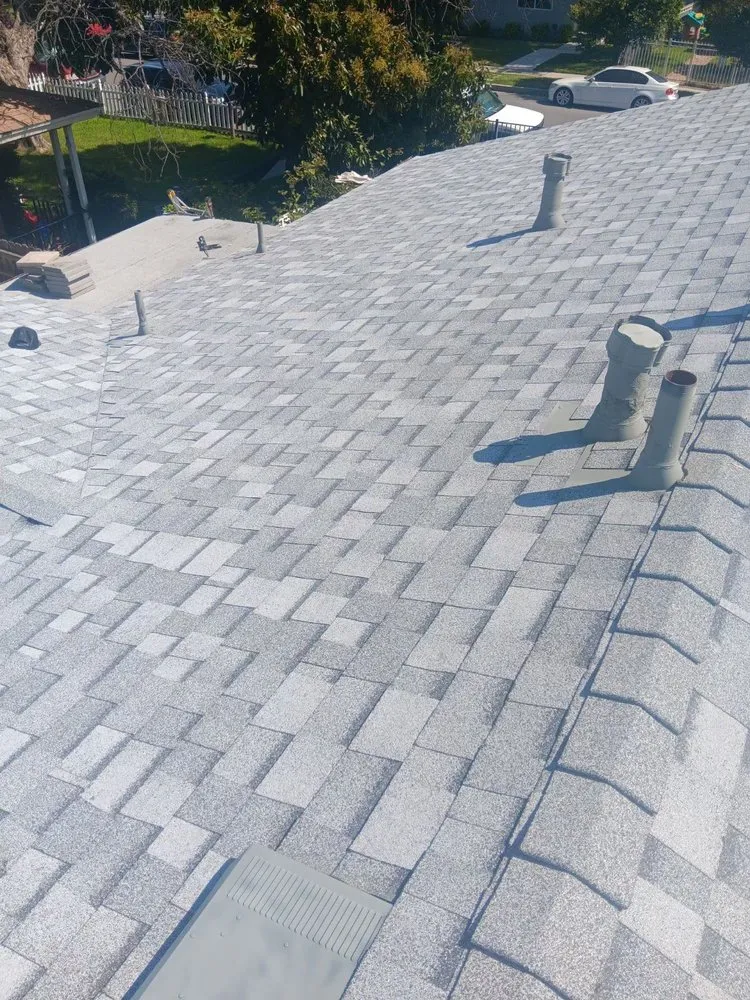 Slide of All American Construction and Roofing