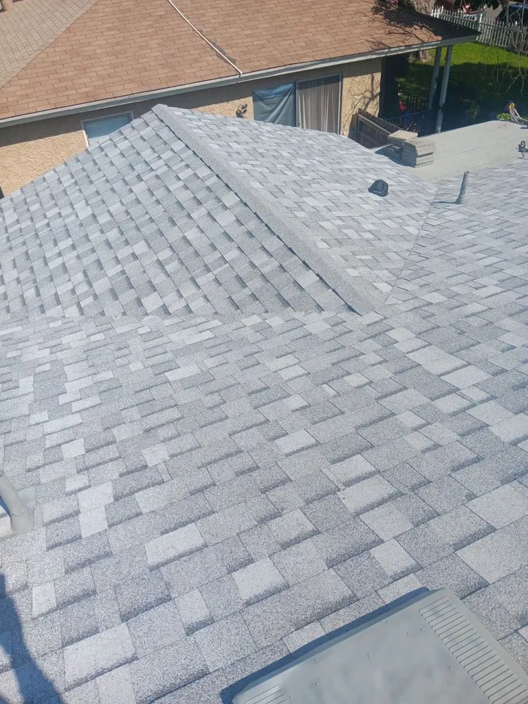 Slide of All American Construction And Roofing