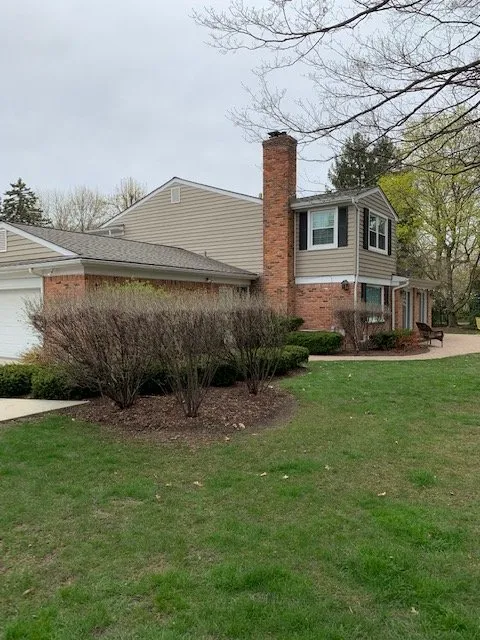 Slide of All American Construction Roofing