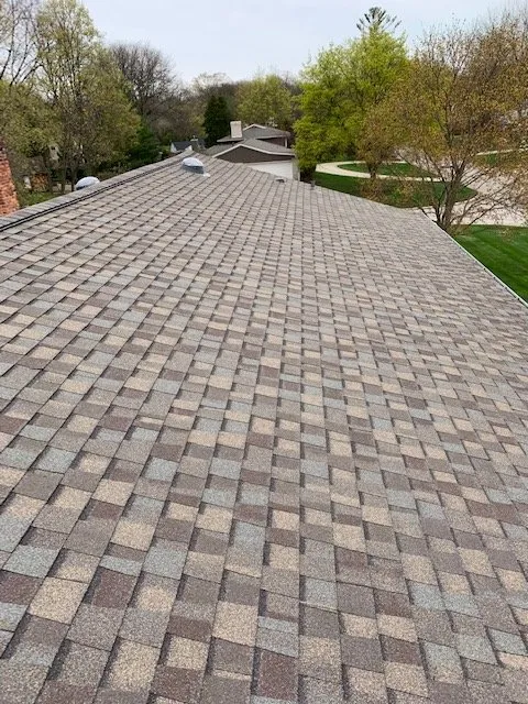 Slide of All American Construction Roofing