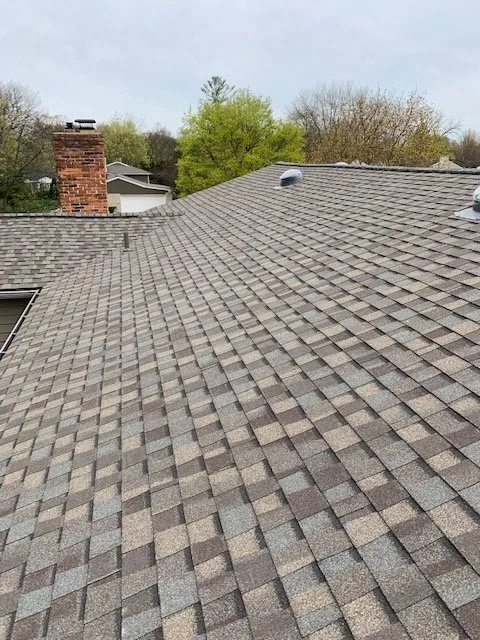 Slide of All American Construction Roofing