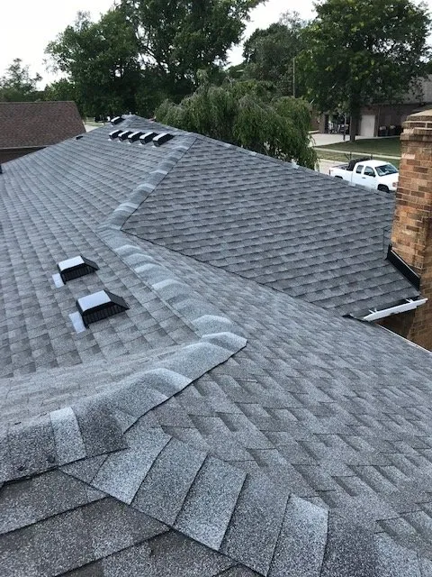 Slide of All American Construction Roofing