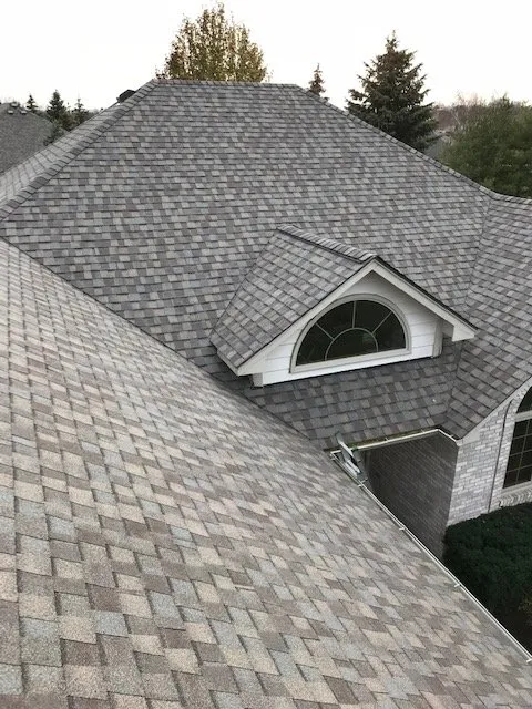 Slide of All American Construction Roofing