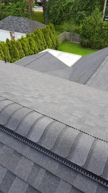 Slide of All American Construction Roofing