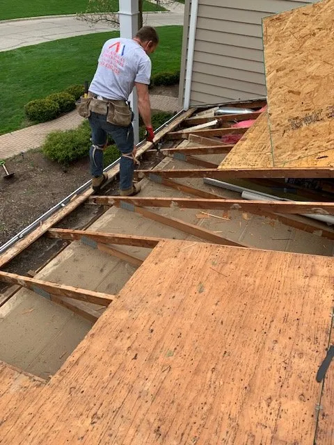 Slide of All American Construction Roofing