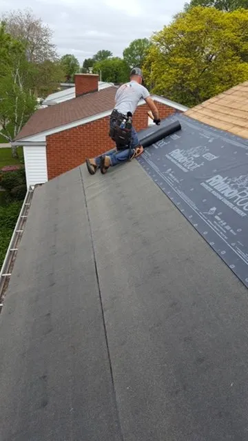 Slide of All American Construction Roofing