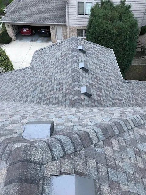 Slide of All American Construction Roofing