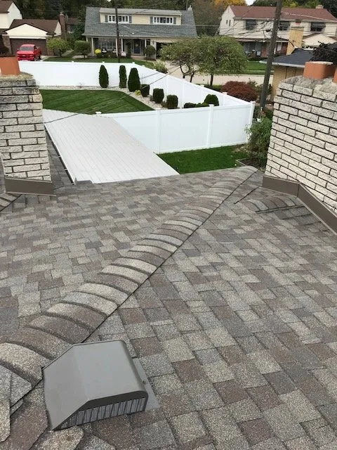 Slide of All American Construction Roofing