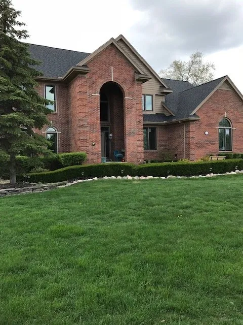 Slide of All American Construction Roofing