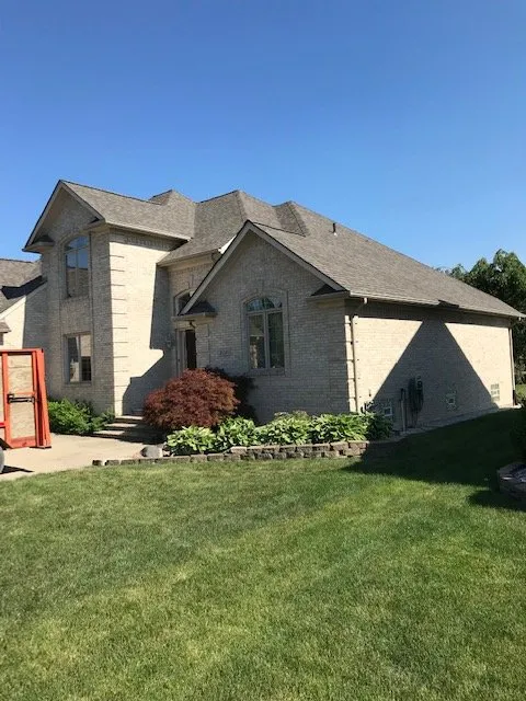 Slide of All American Construction Roofing