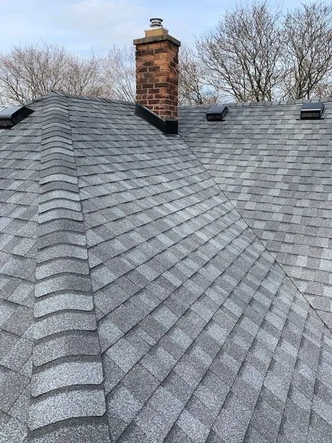 Slide of All American Construction Roofing