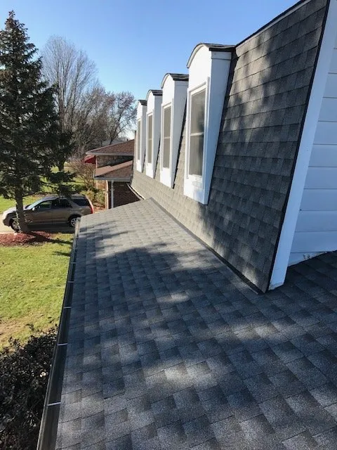 Slide of All American Construction Roofing