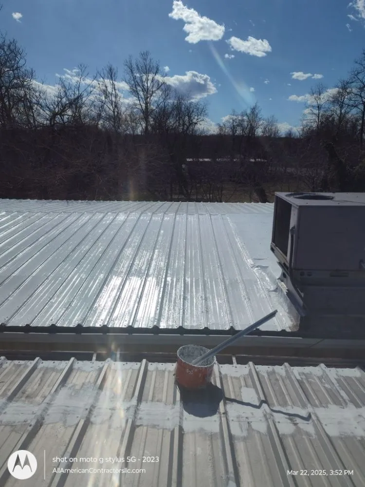 Slide of All American Contractors