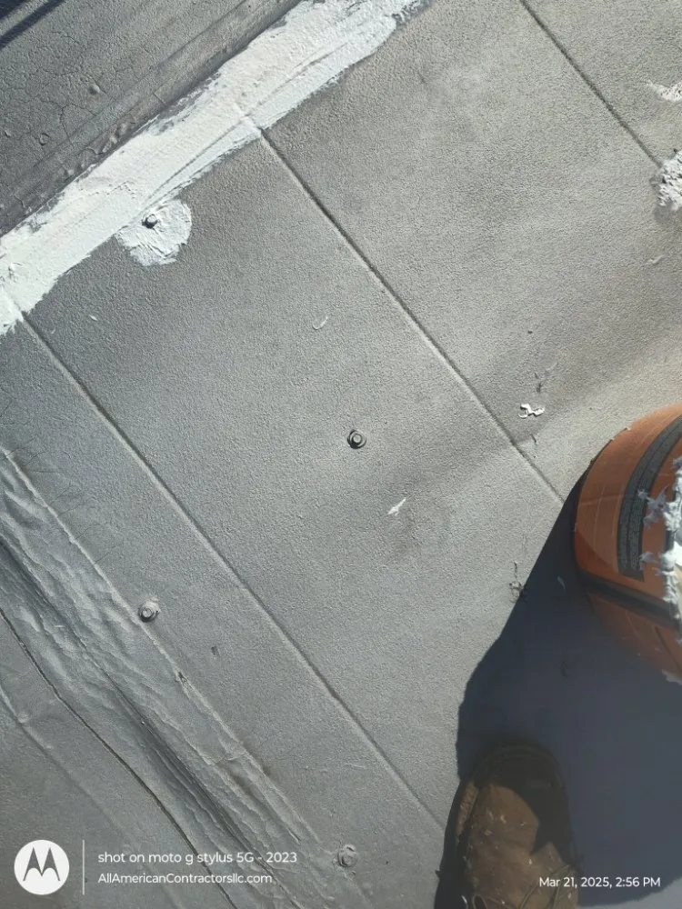 Slide of All American Contractors