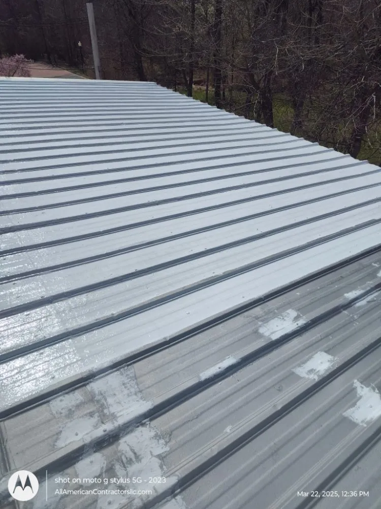 Slide of All American Contractors