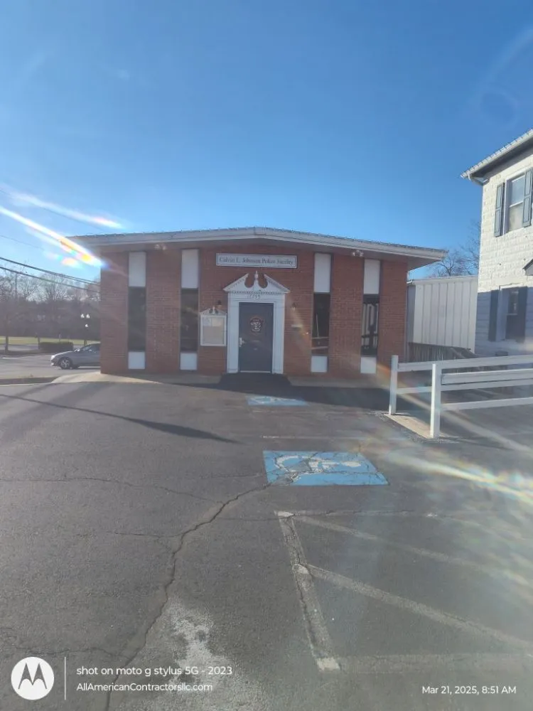 Slide of All American Contractors