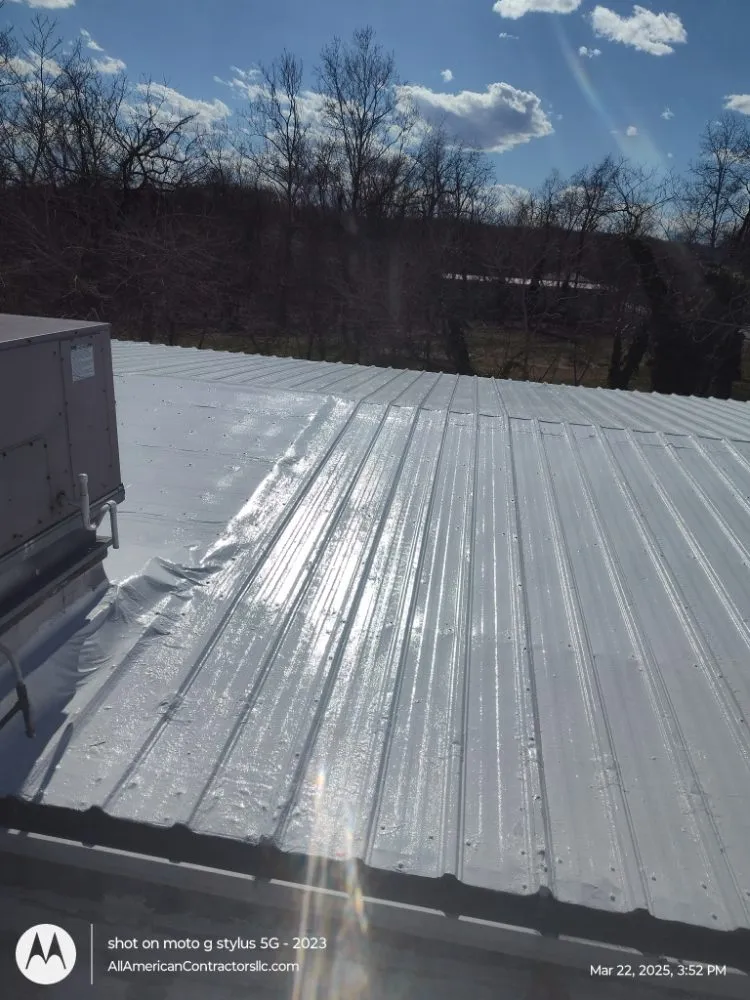 Slide of All American Contractors