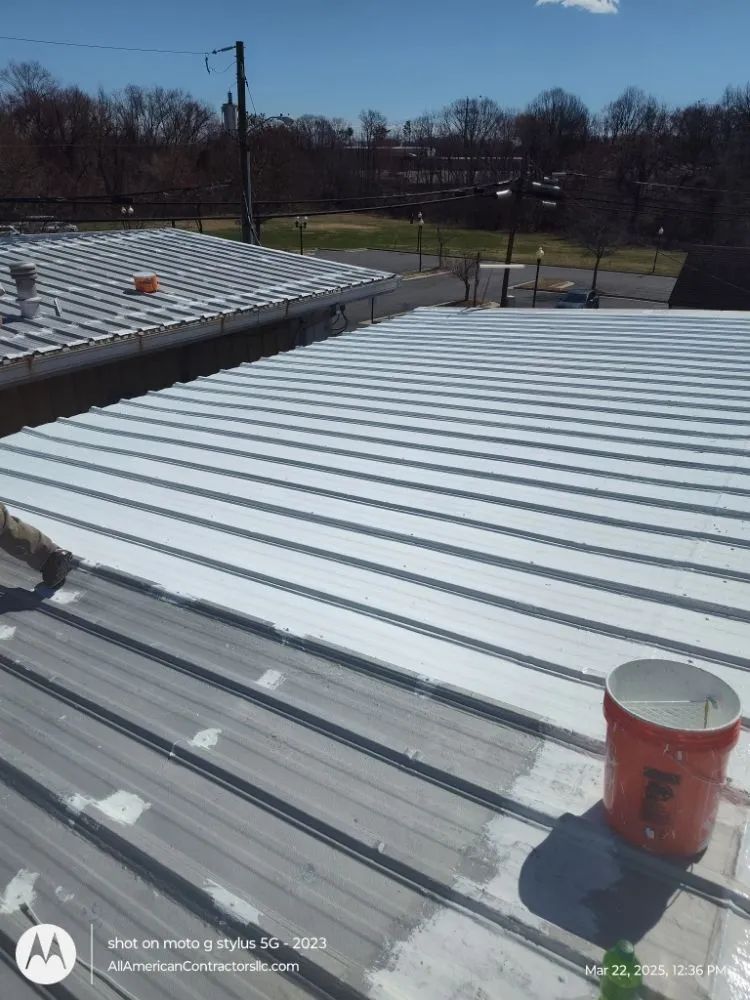 Slide of All American Contractors