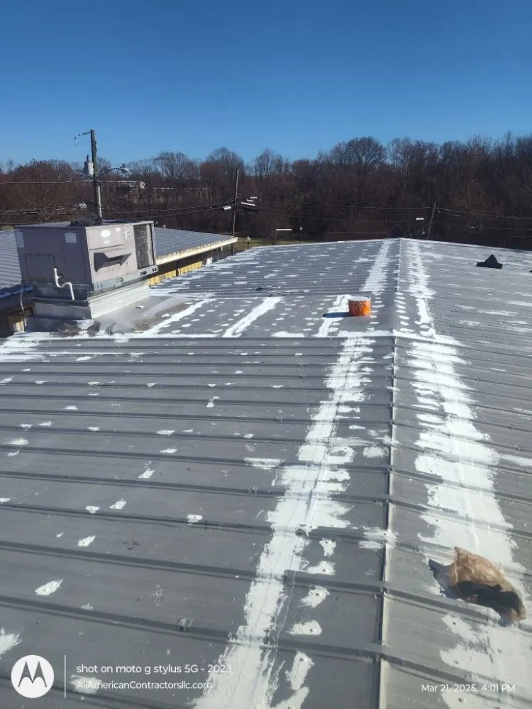 Slide of All American Contractors