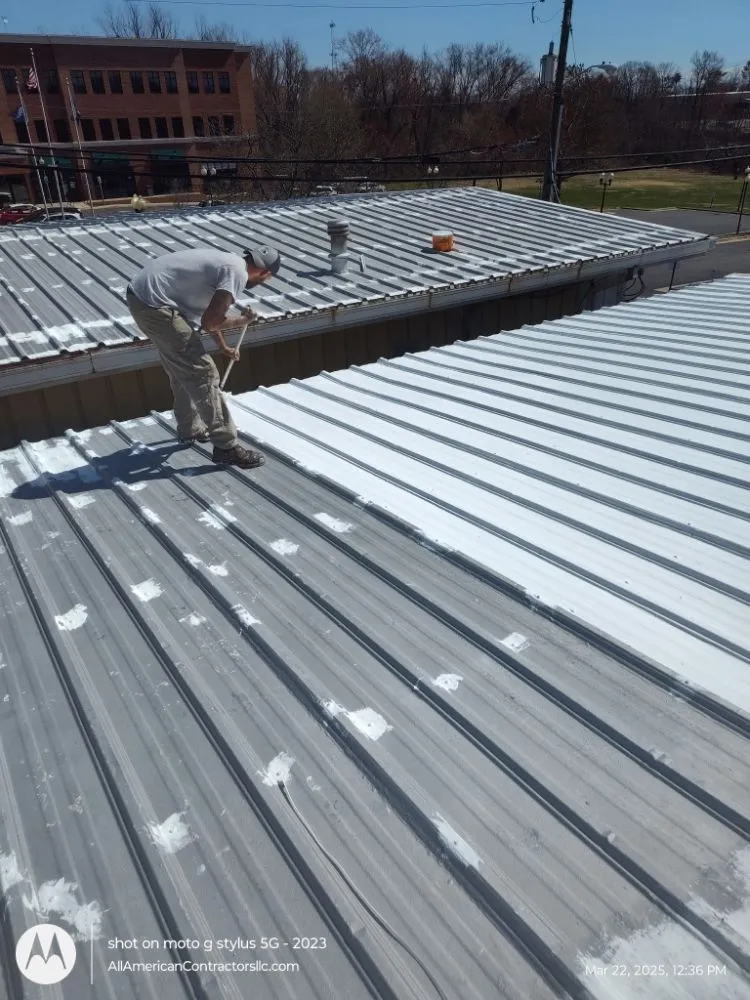 Slide of All American Contractors