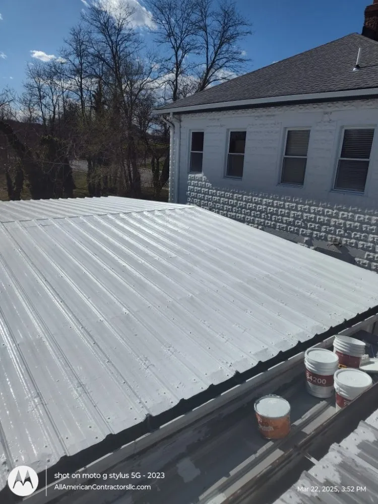 Slide of All American Contractors