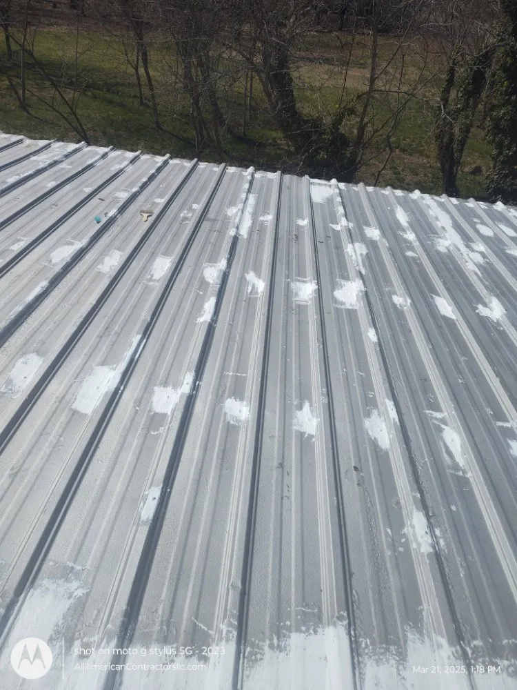 Slide of All American Contractors