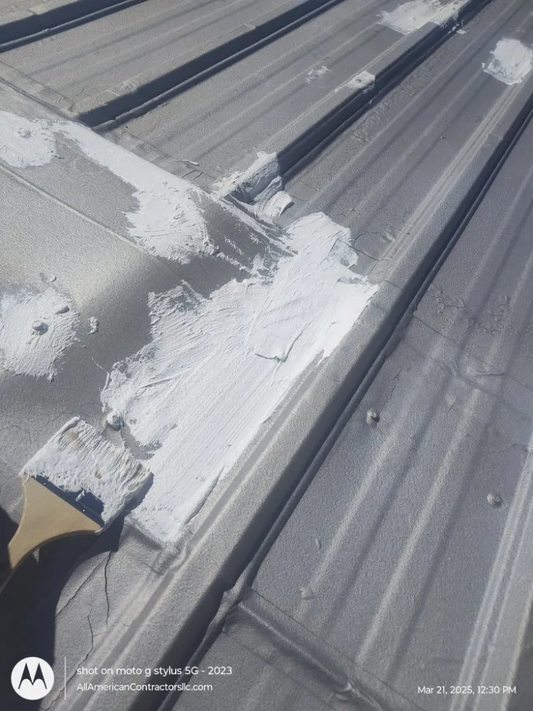 Slide of All American Contractors