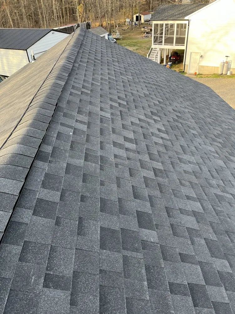 Slide of All American Contractors