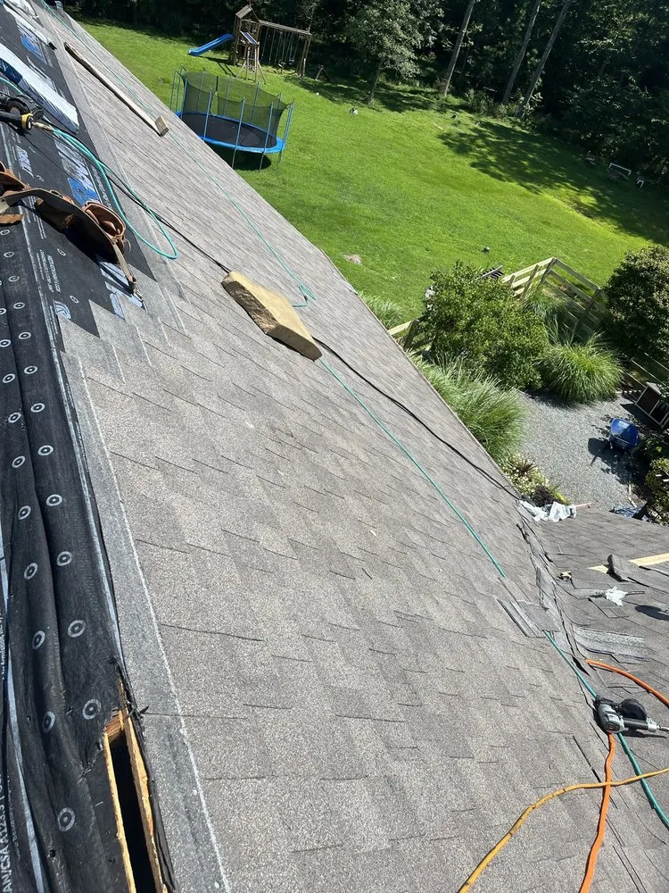 Slide of All American Contractors