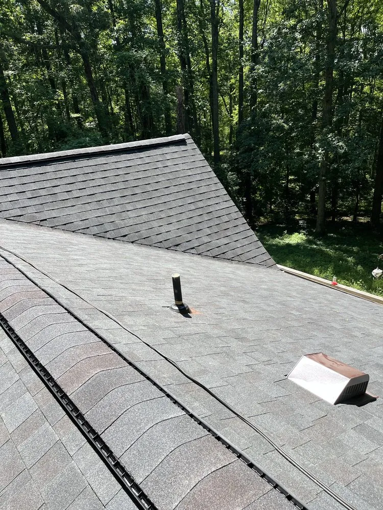 Slide of All American Contractors