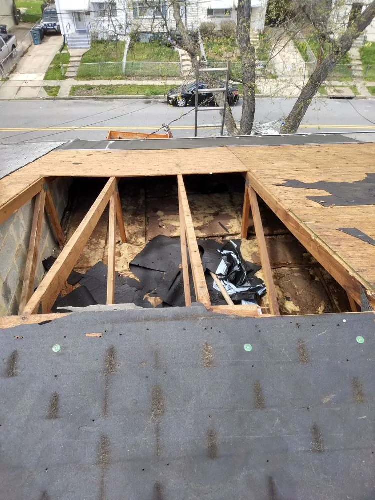 Slide of All American Contractors