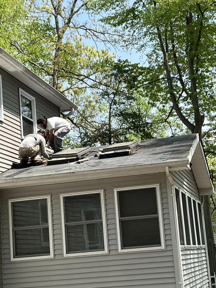 Slide of All American Contractors