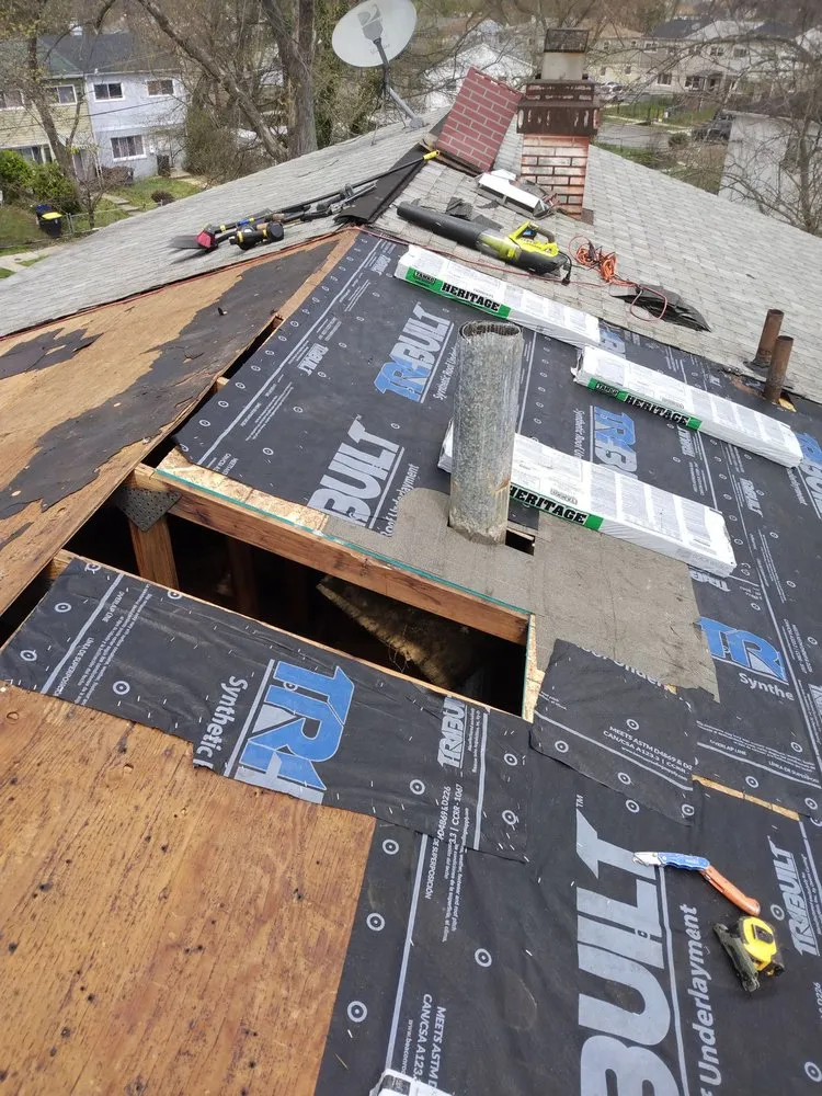 Slide of All American Contractors