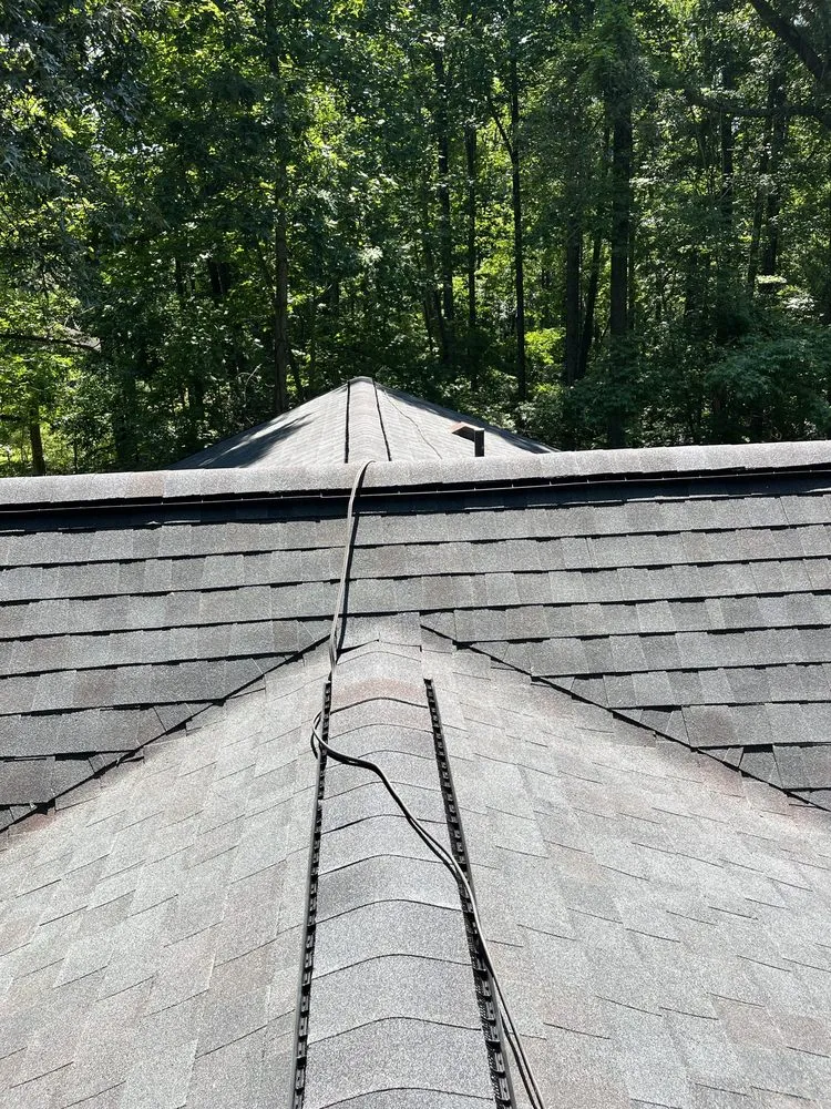 Slide of All American Contractors