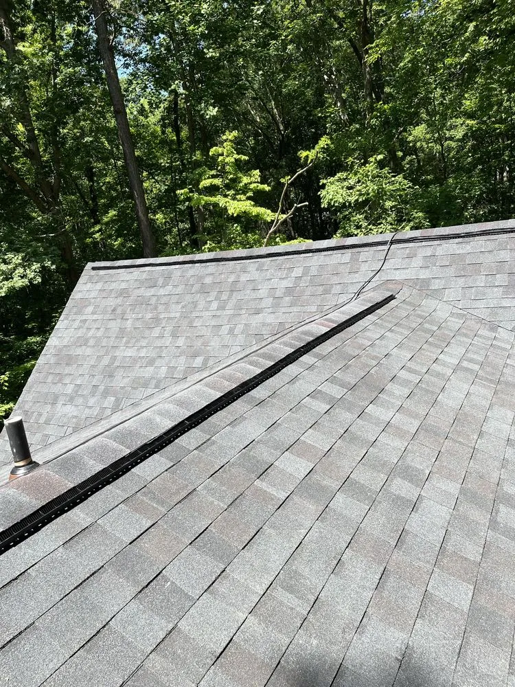 Slide of All American Contractors