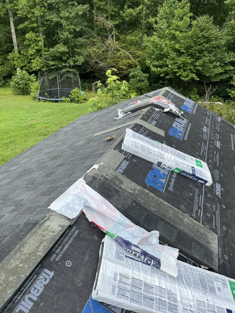 Slide of All American Contractors