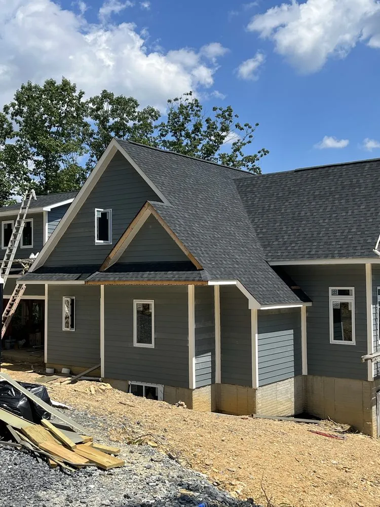 Slide of All American Contractors