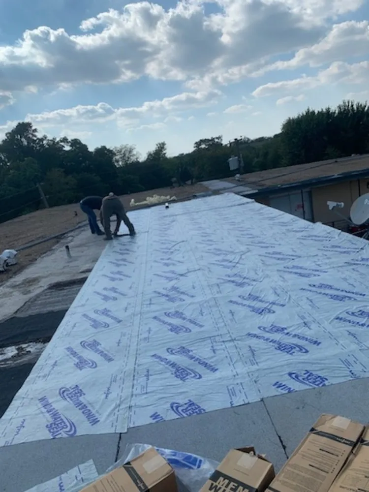 Slide of All American Contractors