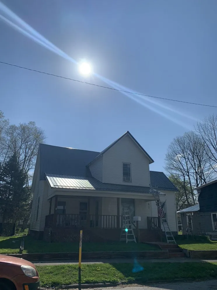 Slide of All American Exteriors