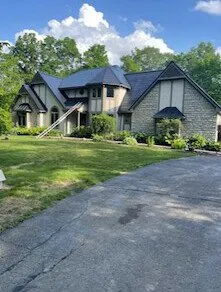 Slide of All American Exteriors