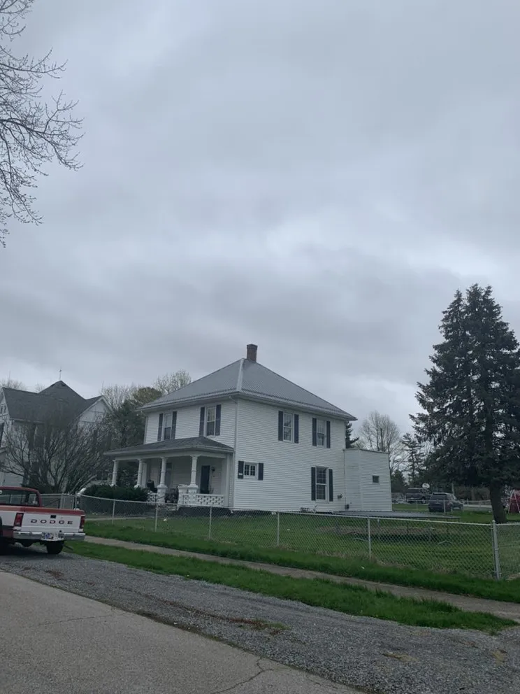 Slide of All American Exteriors