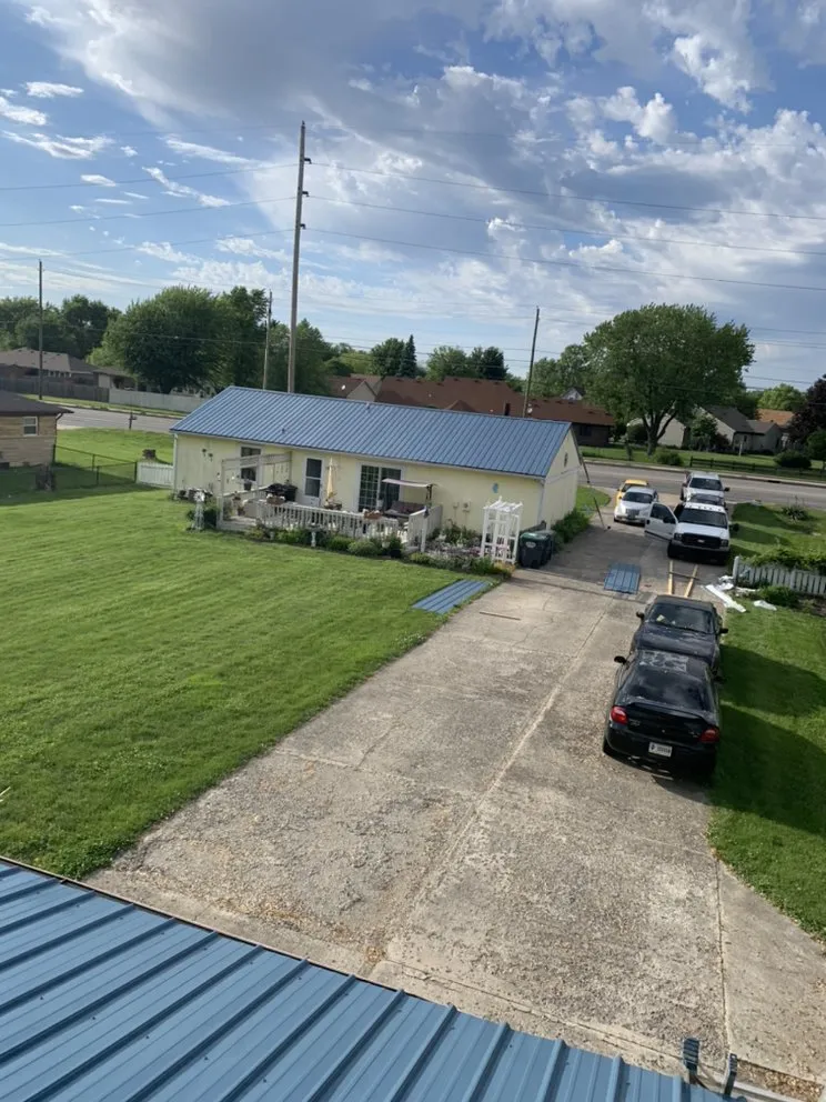 Slide of All American Exteriors