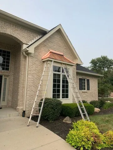 Slide of All American Exteriors