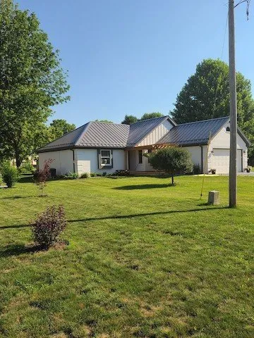 Slide of All American Exteriors